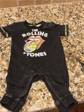 The Rolling Stones Black Baby Footie with Multi-Color Tongue Graphic